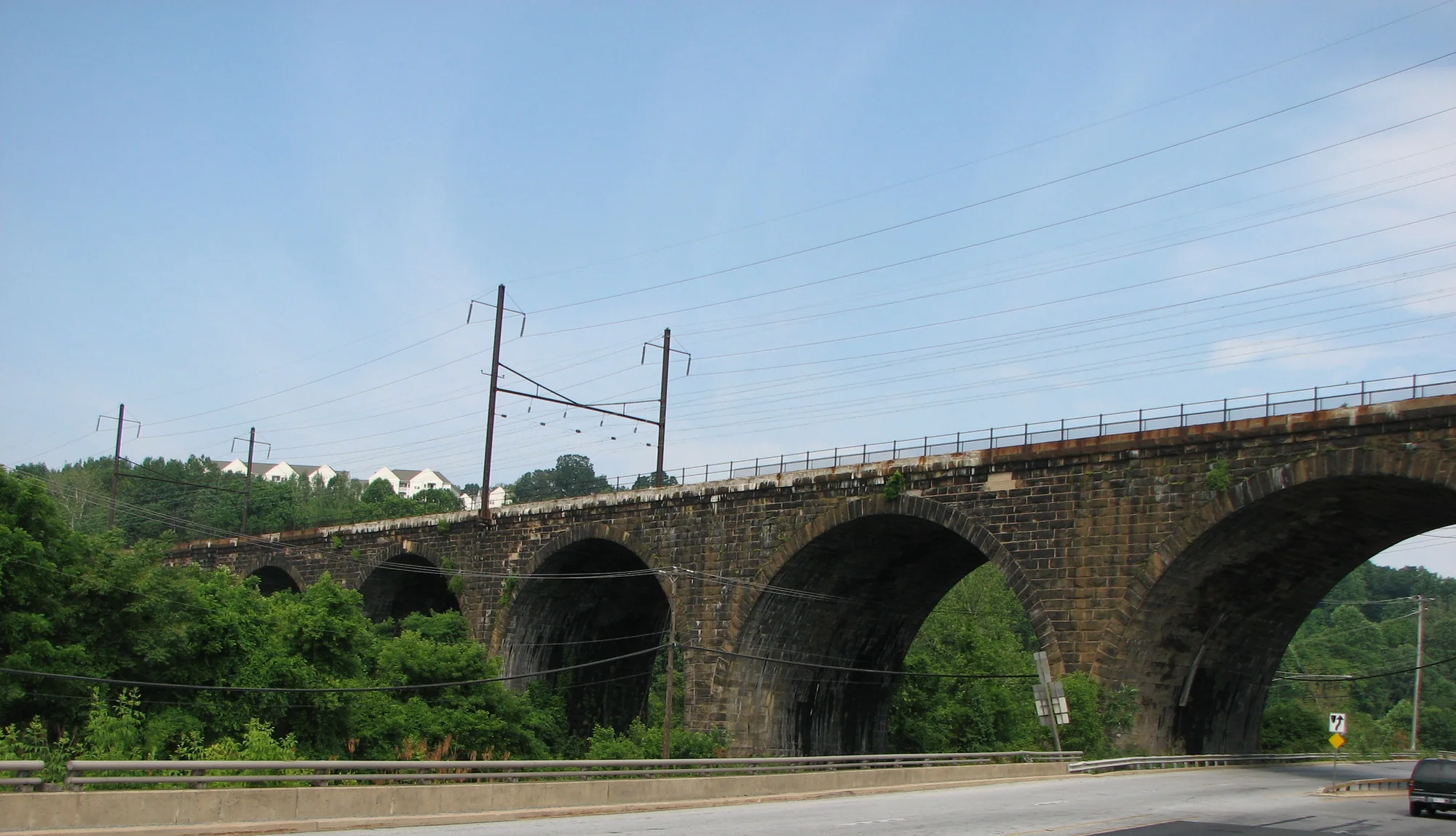 Stone arches of Coatesville High Bridge over the West Branch Brandywine Creek, photographed in June 2008.