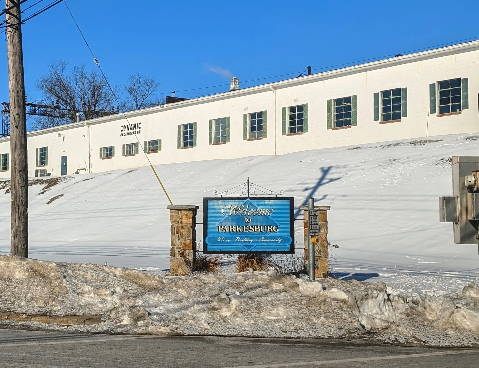 A Parkesburg welcome sign at the entrance near East First Avenue and Church Street, photographed in February 2026.