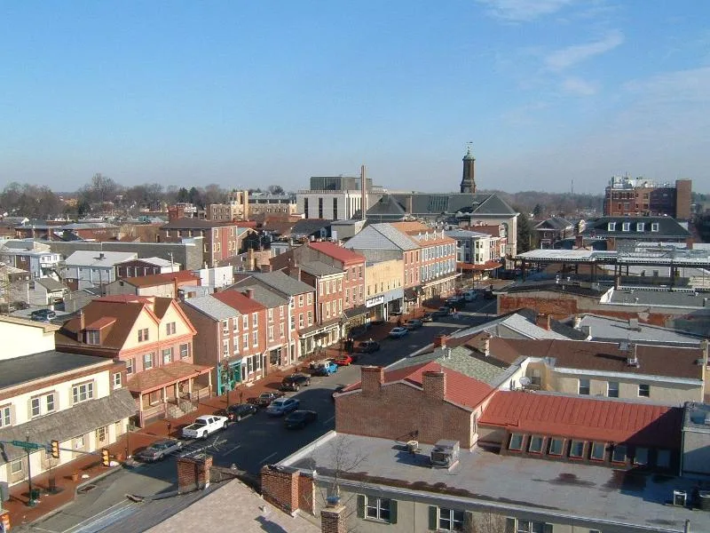 A 2006 elevated view across West Chester’s town center, with Market Street rooftops and the courthouse tower in the distance.